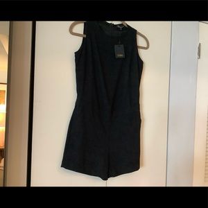 Black sleeves less short/ romper.